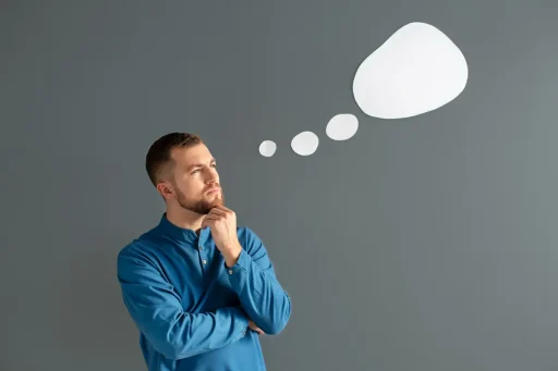 Man deep in thought with thought bubbles above his head, representing the concept of testing advice and making informed decisions